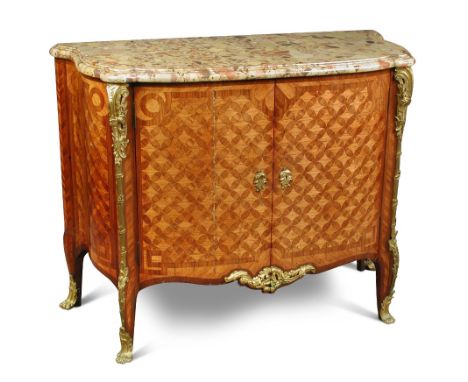 A Louis XV parquetry inlaid bow front commode, scagliola marble top above two doors, with ormolu mounts and sabot 88 x 111 x 