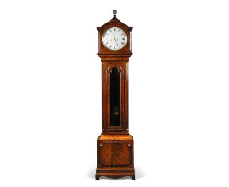 A Regency figured mahogany longcase clock, in Regulator style, with ball topped pyramid finial above circular convex door to 