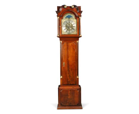 A George III mahogany longcase clock, the rectangular hood with swanneck moulding and reeded columns, above shaped top trunk 