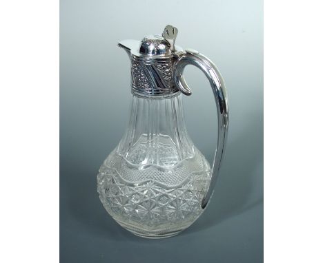 A Victorian silver mounted glass claret jug,  by Jenkins & Timm, Sheffield 1898, flask shaped, the cut glass body extensively