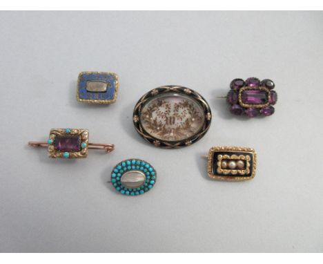 A collection of Georgian lacepins and other similar brooches, four of the lacepins of typical Georgian form, being rectangula