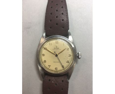 Rolex - A gentleman's steel Oyster Perpetual Precision wristwatch, circa 1960, with 28mm cream coloured round dial, gold colo