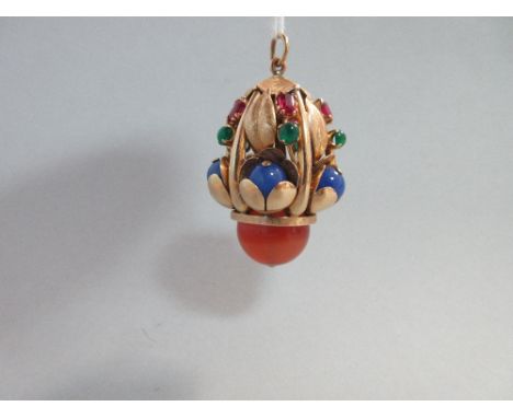 A large gemset pendant in the manner of Seaman Schepps, with five sections in a pierced lantern formation under a textured fi