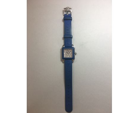 Chopard - A lady's 'Happy Sport' wristwatch,  with plain square floating diamond silver wave dial, blued sword shaped hands a