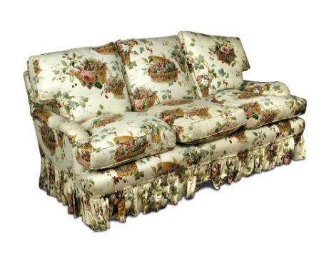 A country house sofa, upholstered in a printed floral fabric, with loose cushion seat 84 x 188 x 95cm (33 x 73 x 37in)  The c