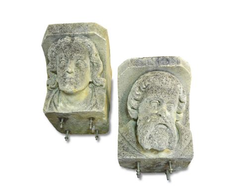 A pair of architectural stone figure heads of St Simon and St John, (2) 40 x 36 x 55cm (16 x 14 x 21in)  Weathered as expecte