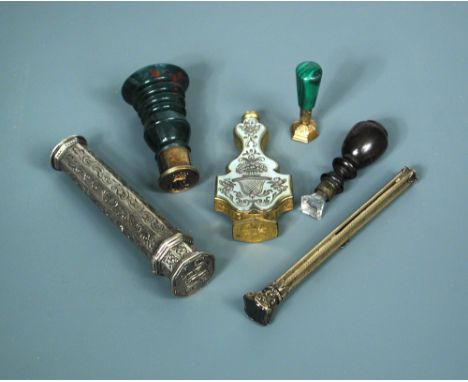 Six various desk seals, with handles of wood, malachite and bloodstone, the mother of pearl handled example with a pen holder