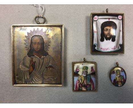 A silver gilt covered icon and three enamelled miniatures, the first painted with Christ, 84 silver mark, 7 x 6cm (2.75 x 2.2