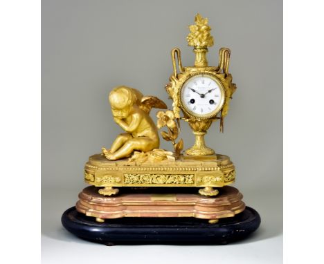 A 19th Century French Gilt Metal Mantel Clock retailed by Howell James &amp; Co., the 3ins white enamel dial with Roman numer