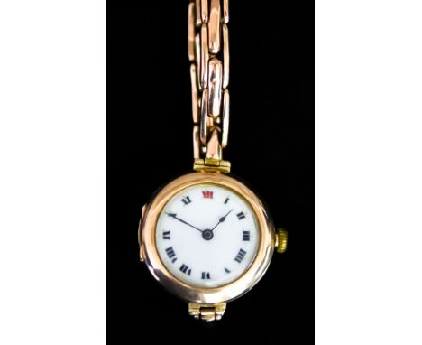 An Early 20th Century 9ct Gold Lady's Manual Wind Wristwatch, by Rolex, 9ct gold case, 30mm diameter, white enamelled dial wi