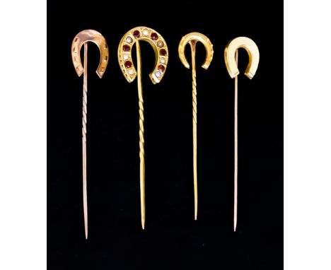 A Mixed Lot of Four Horseshoe Stick Pins, comprising - one 15ct gold, 1.4g, one yellow metal (tests as 18ct) 1.8g, one 18ct 1