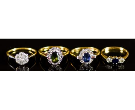 Four 18ct Gold Gem Set Rings, Modern, comprising - three rings set with blue stones and diamonds, sizes  N+, M, K, and one sm