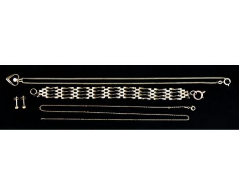 A Mixed lot of 9ct Gold, comprising - four bar gate bracelet, 180mm overall, heart-shaped pendant set with white stone on fin