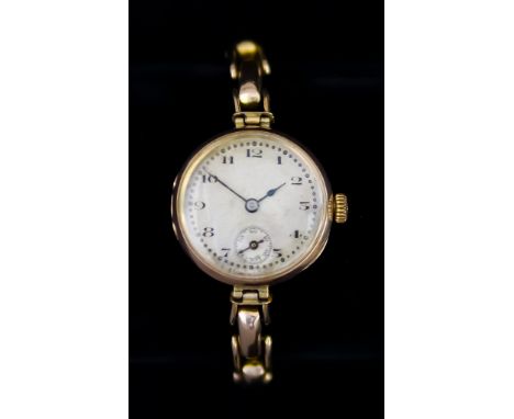 An Early 20th Century 9ct Gold Lady's Manual Wind Wristwatch, by Rolex, 9ct gold case, 24mm, silvered dial with Arabic numera