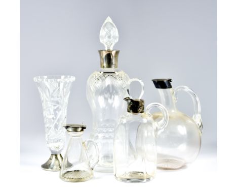 A Victorian Silver Mounted and Clear Glass Claret Jug and Four Other Silver Mounted Glass Items, the claret jug with mount by