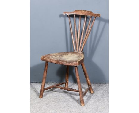 A 19th Century Primitive Stick Back Windsor Chair, with narrow curved crest rail and on turned and splayed supports, 29ins hi
