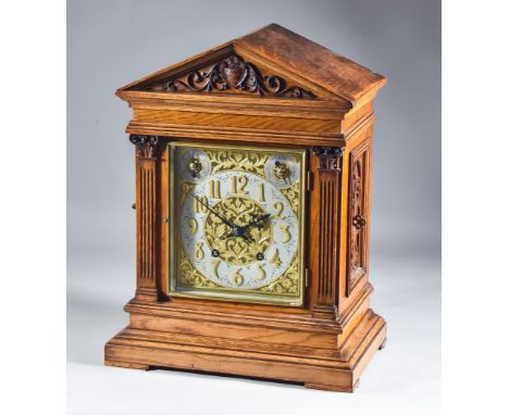 A Late 19th/Early 20th Century German Oak Cased Mantel Clock by Winterhalder &amp; Hofmeier, the 5.5ins silvered chapter ring