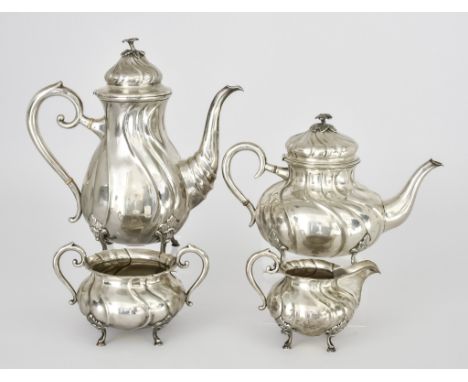 A Scandinavian Harlequin Silver Four-Piece Tea and Coffee Service, stamped Frisenberg 830 Standard, of spiral bulbous form, t