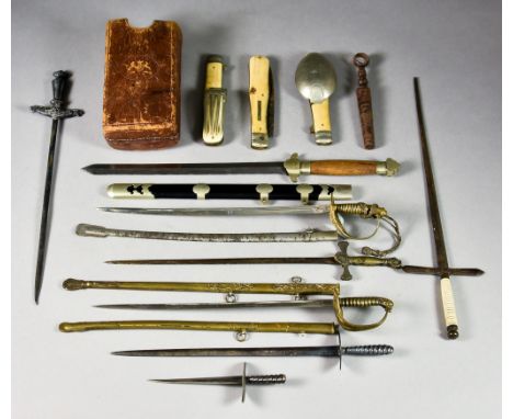 A Late 19th/Early 20th Century Gentleman's Travelling Companion, comprising - knife, fork, spoon and corkscrew in leather tra