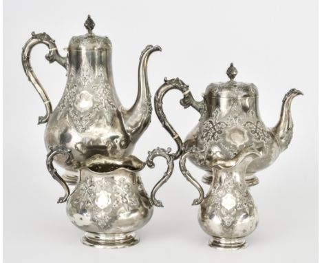 A Victorian Silver Four-Piece Tea and Coffee Service, by Robert Hennell III, London 1860 and retailed by Ollivant &amp; Botsf