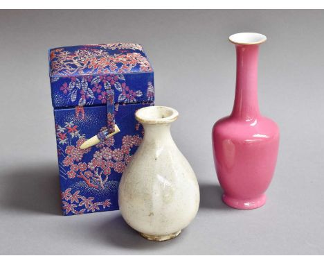 A Chinese Pink Glazed Bottle Vase, with red printed seal mark, 14cm high, and A Chinese Song Style Pear Formed Bottle Vase, 1