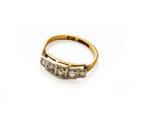 A Diamond Five Stone Ring, stamped '18CT' and 'PLATINUM', finger size NThe ring is in good condition, the approximate qualiti