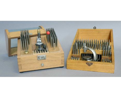 A Selection of Watchmakers Tools Comprising: two staking sets, watch mainspring winders, watch case back opening tool, watch 