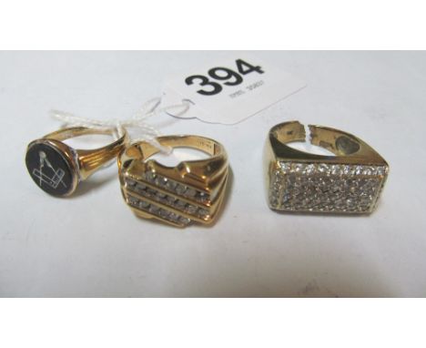 A gent's diamond ring marked 10k, a 9ct Masonic ring and another