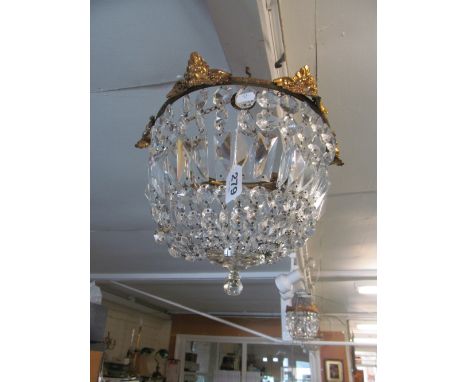 A basket ceiling light with mask design
