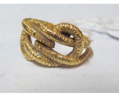 A yellow metal ring marked 750