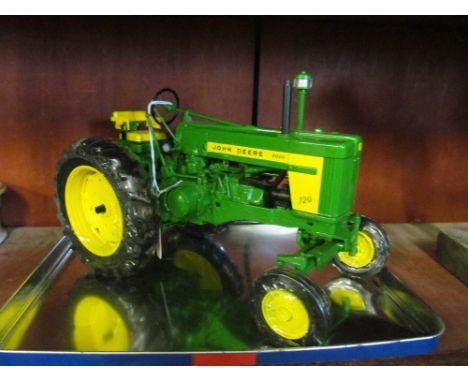 A John Deere 720 tractor