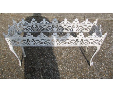 A garden trough stand and wall plaque