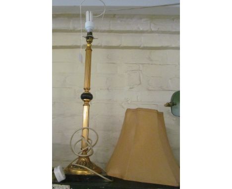 A gilt slender reeded column table lamp