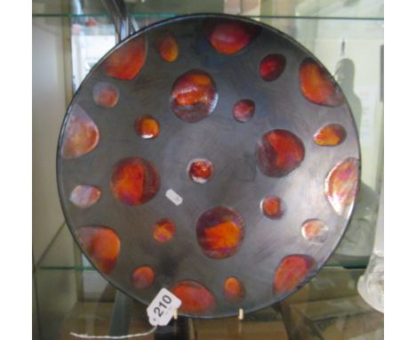 A large Poole Pottery charger matt black and orange