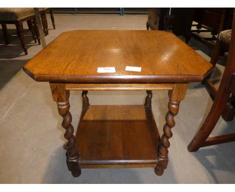 An oak Occasional Table on twist legs with under shelf   