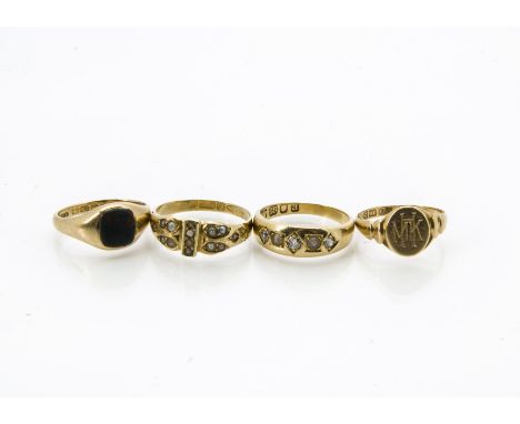 A group of four Victorian and later gold children's / small rings, including a 15ct gold and seed pearl ring, and an 18ct gol