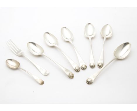 A set of six George III silver dessert spoons, old English with shell, having engraved family crest, marks worn, together wit
