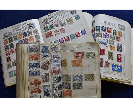 A collection of vintage stamps, in four small school boy albums and loose together with some FDCs and postcards (parcel) 