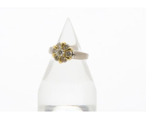 A modern 18ct white gold and diamond flower head cluster ring, 7g and size M 