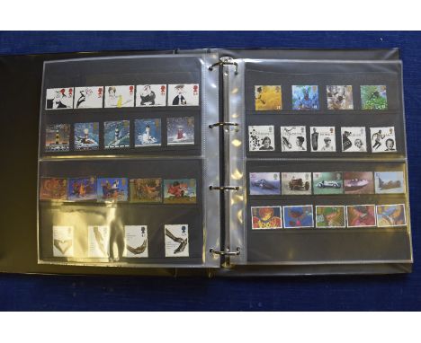 A collection of vintage and modern British Stamps and First Day Covers, including a ring binder with some mint and presentati