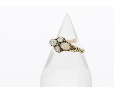 A 19th century gold and opal ring, the tablet set with four oval opals and a small rose cut diamond, 1.8g and size P 