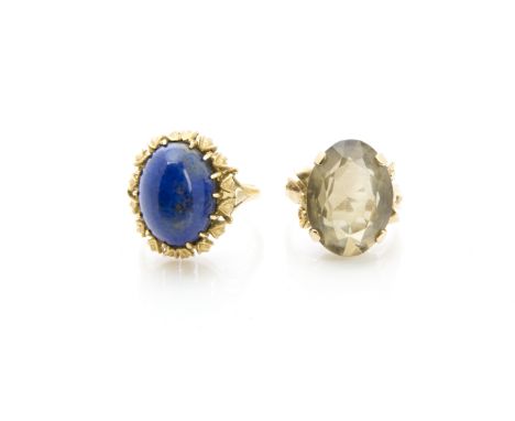 Two retro gold and single stone dress rings, one marked 750 with cabochon lapis lazuli stone, 8.4g and another with citrine m