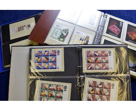 A collection of vintage and modern postcards, including two shoe boxes and an album with 20th century postcards and three alb