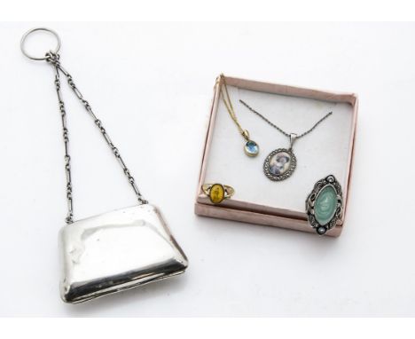 A 9ct gold and amber ring, together with a 9ct gold pendant and blue stone pendant on chain, a silver purse, a silver portrai