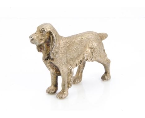 A modern silver figure of a dog from A.E. Jones, the specially commissioned naturalistic model of a cocker spaniel stood pois