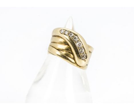 A 19th century continental gold and diamond ring, modelled as a stylised coiled serpent and set with seven graduating old cut