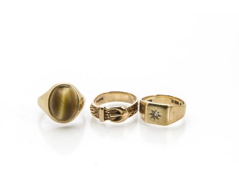 Three vintage 9ct gold rings, including a tigers eye signet ring, a diamond signet ring and a belt example, 15.6g (3) 