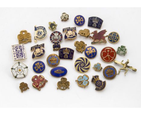 A collection of vintage and modern Girl Guides badges, most with enamel decoration, varying designs (parcel) 
