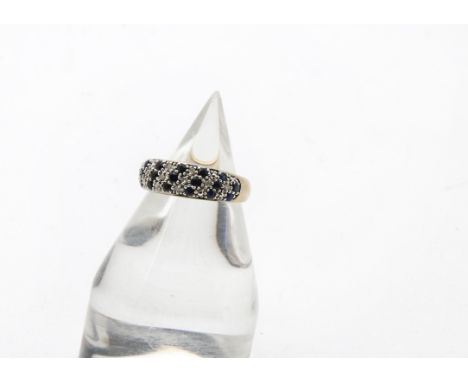 A modern 9ct gold sapphire and diamond bombe ring, 2.4g and size L 