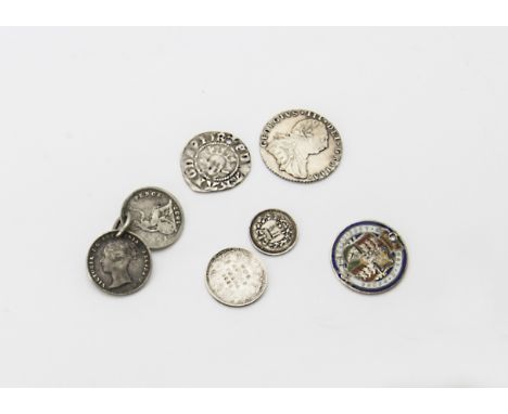 A George III 1787 six pence, EF, together with a drilled Tudor hammered penny, an 1891 two anna, an 1843 1 1/2 pence, a drill